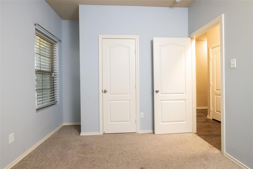 121 Mitchell Circle Terrell, TX 75160 - Photo 14 of 26 a view of an empty room with windows