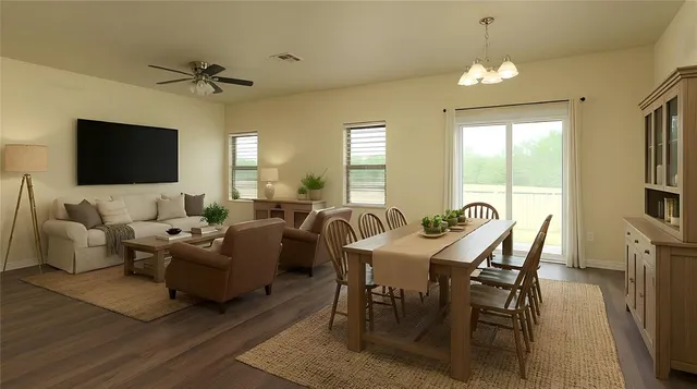a living room with furniture a chandelier and a flat screen tv