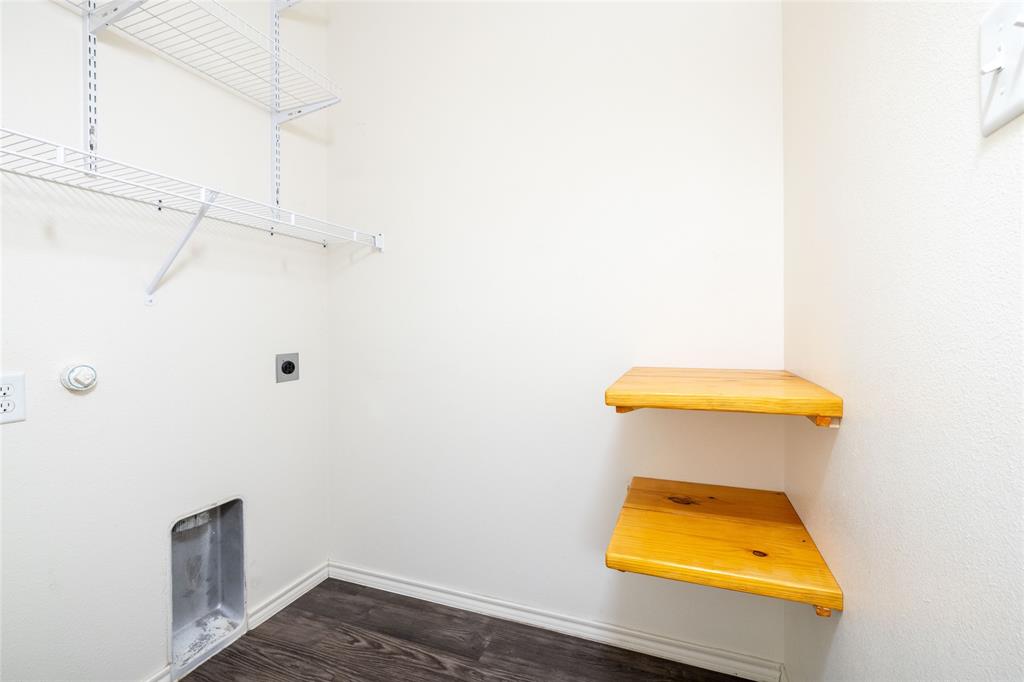 121 Mitchell Circle Terrell, TX 75160 - Photo 21 of 26 a bathroom with a sink and a toilet