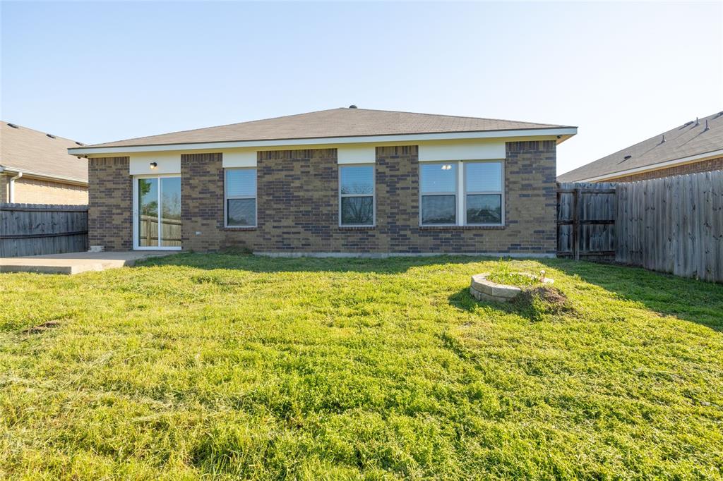 121 Mitchell Circle Terrell, TX 75160 - Photo 25 of 26 a swimming pool with outdoor seating and yard