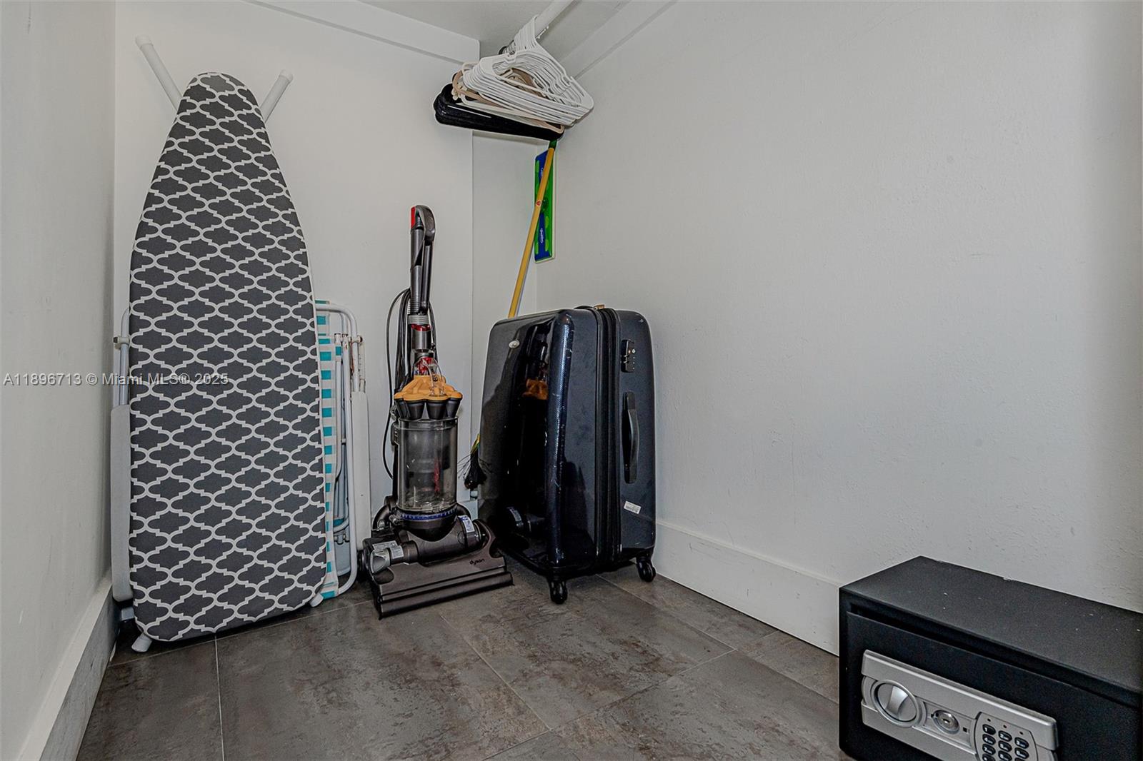 2301 Collins Avenue, Unit 723 Miami Beach, FL 33139 - Photo 24 of 26 a view of room with gym equipment