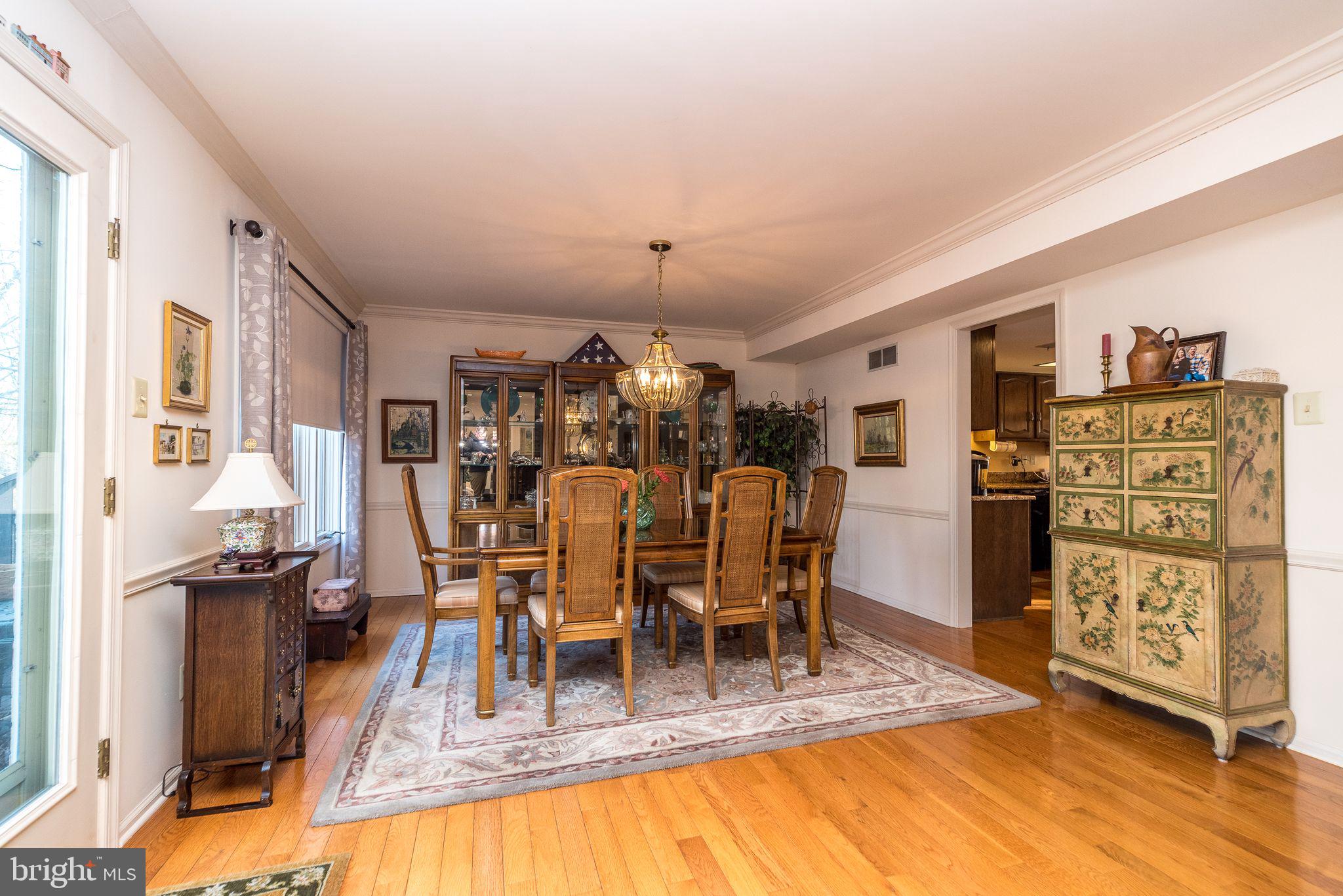 68 Amity Drive Chesterbrook, PA 19087 - Photo 15 of 62 a view of a dining room kitchen and living room