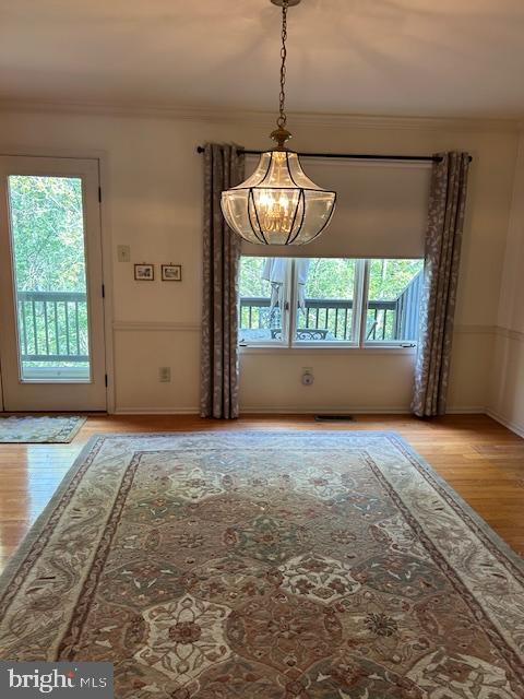 68 Amity Drive Chesterbrook, PA 19087 - Photo 17 of 62 a view of empty room with window and chandelier