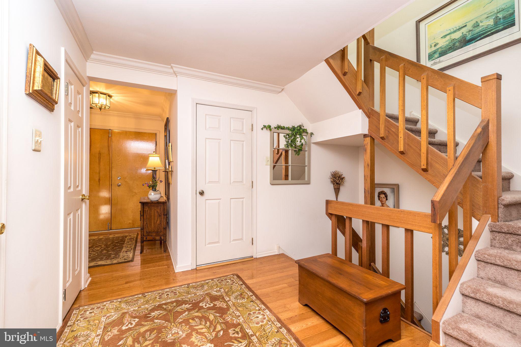 68 Amity Drive Chesterbrook, PA 19087 - Photo 21 of 62 a view of a hallway with wooden floor and entryway
