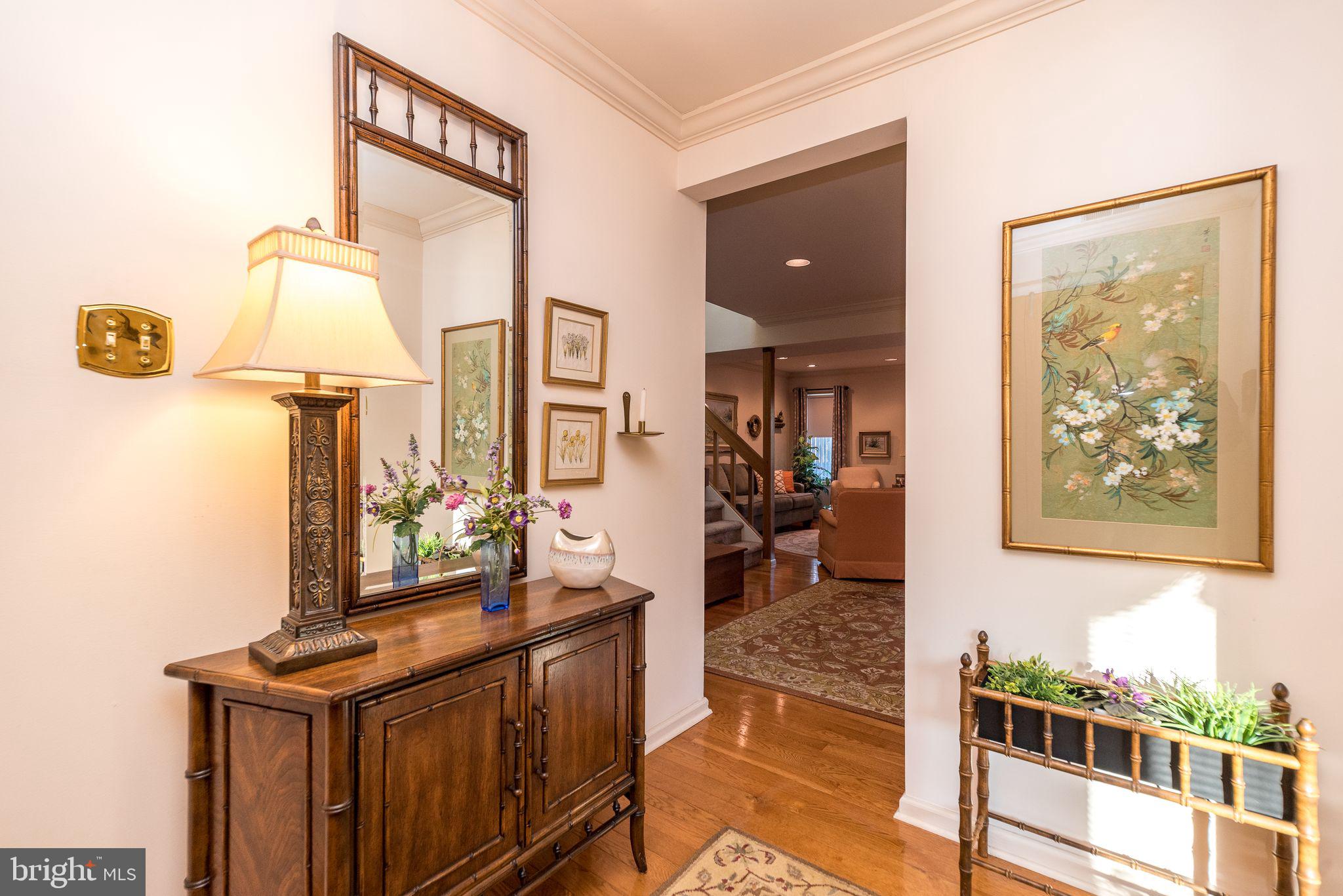 68 Amity Drive Chesterbrook, PA 19087 - Photo 3 of 62 a bathroom with a sink a mirror and a shower