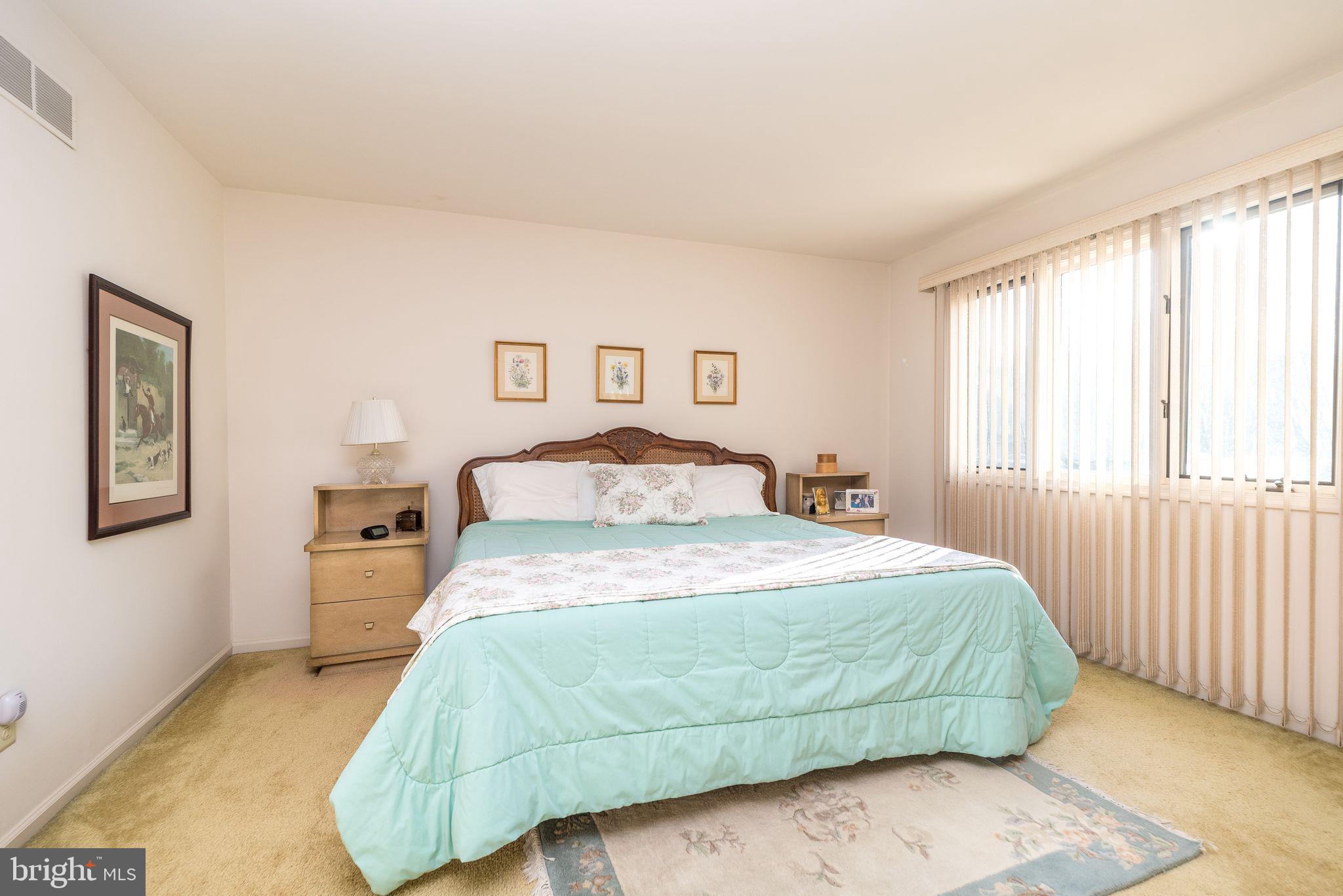 68 Amity Drive Chesterbrook, PA 19087 - Photo 31 of 62 a bedroom with a large bed and a window