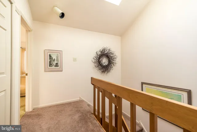 a bedroom with furniture and a fireplace