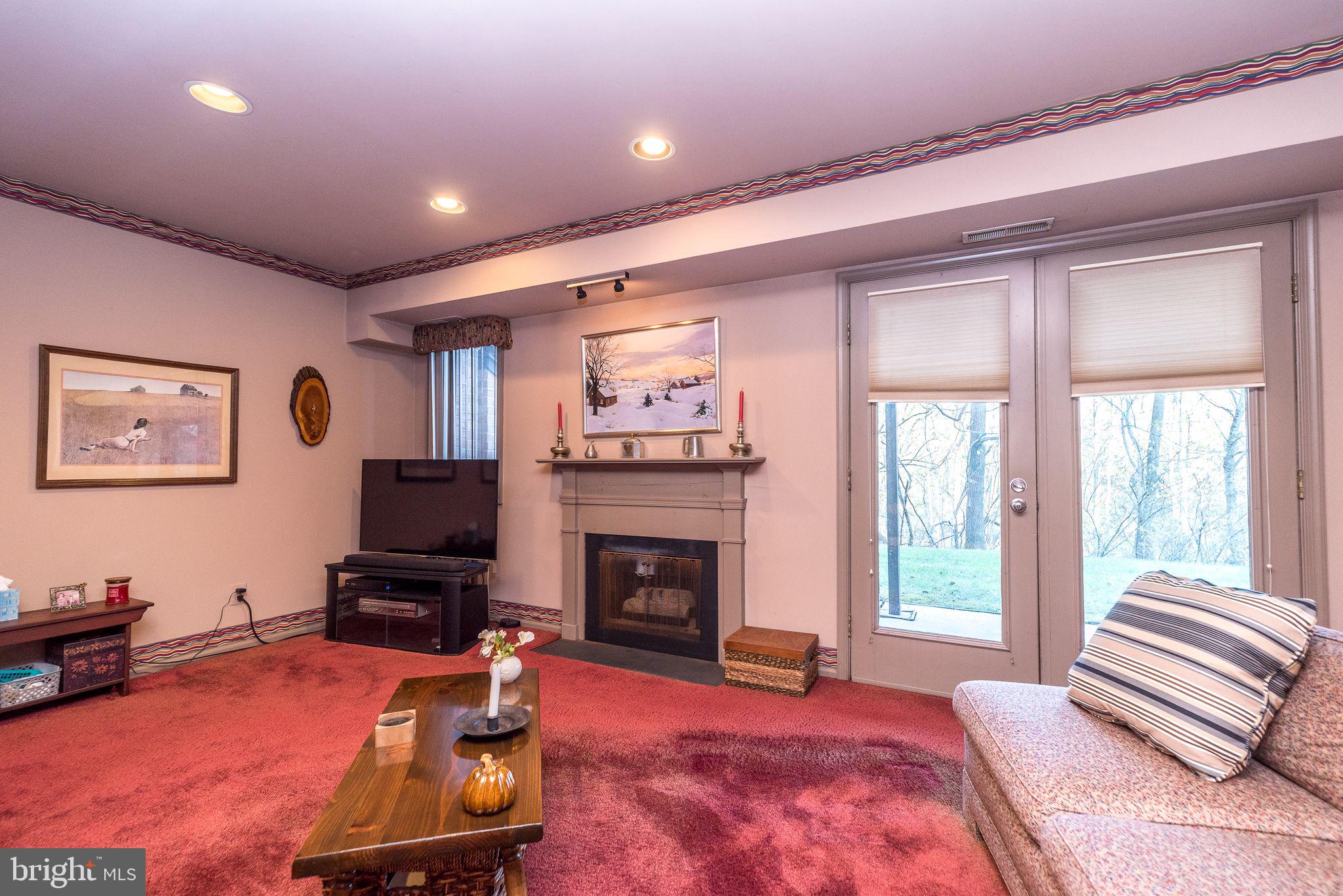 68 Amity Drive Chesterbrook, PA 19087 - Photo 42 of 62 a bedroom with furniture and a fireplace