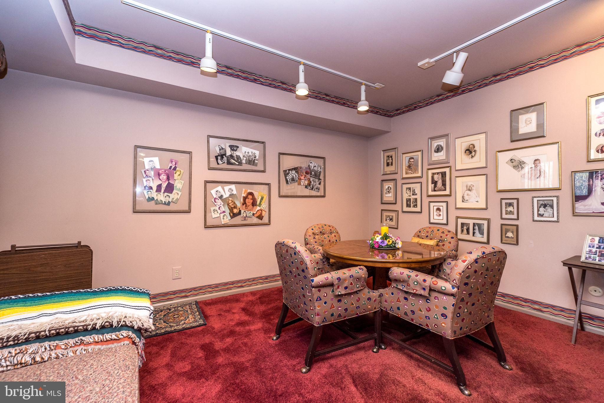68 Amity Drive Chesterbrook, PA 19087 - Photo 47 of 62 a living room with furniture and painting on the wall