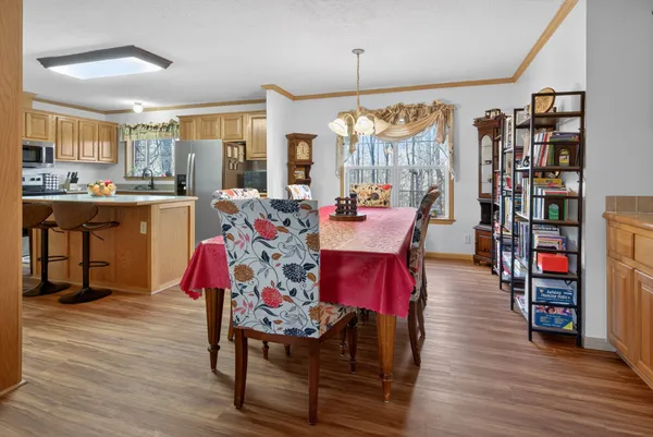 a very nice looking living room with furniture and wooden floor