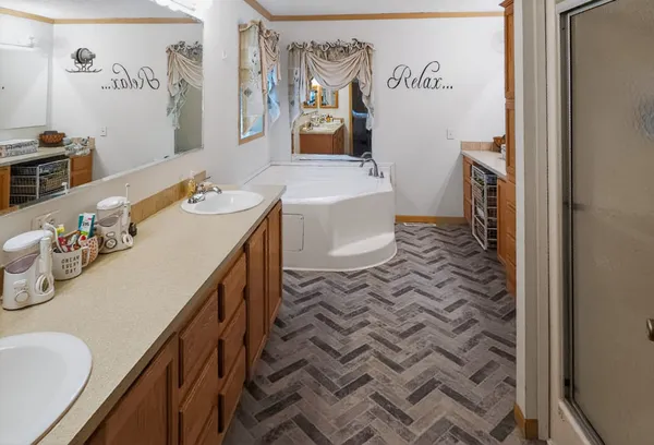 a bathroom with a sink toilet and mirror