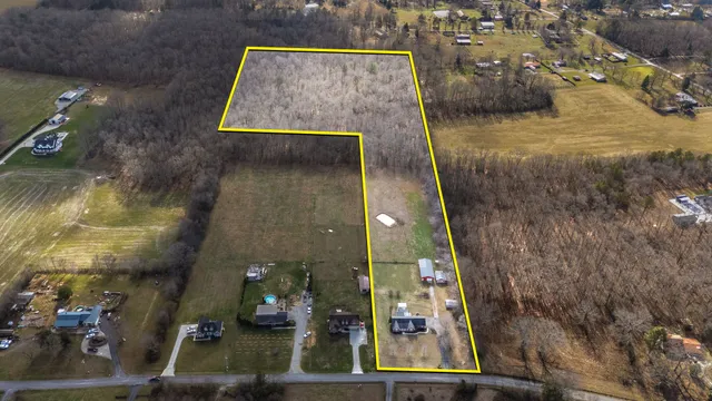 a front view of a house with a large window