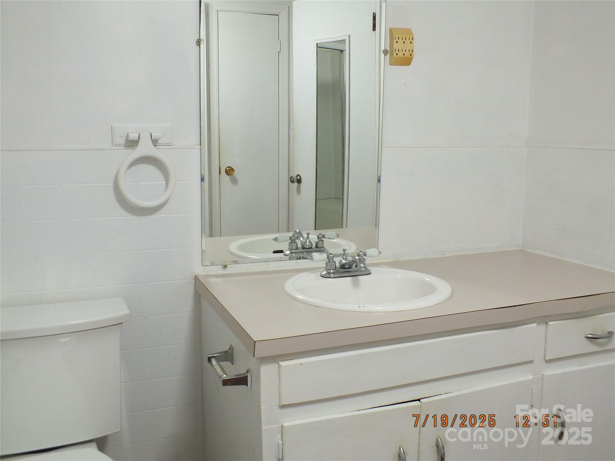 1453 Old Landsford Road Lancaster, SC 29720 - Photo 12 of 39 a bathroom with a sink and a mirror