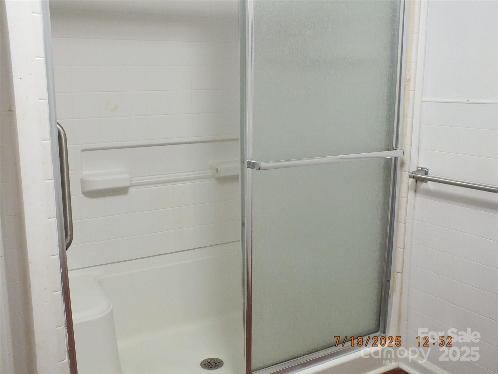 1453 Old Landsford Road Lancaster, SC 29720 - Photo 13 of 39 a bathroom with a glass shower door