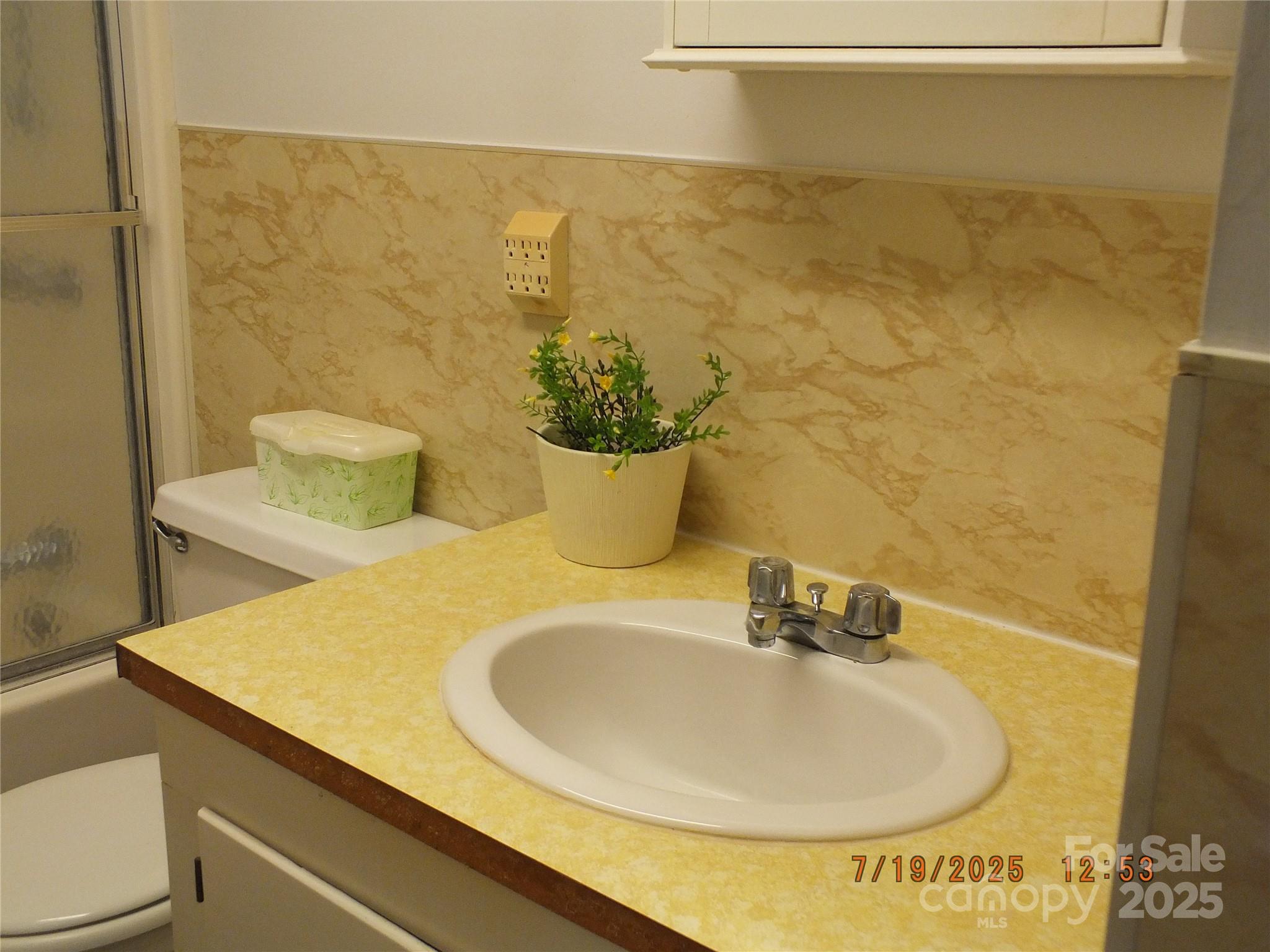 1453 Old Landsford Road Lancaster, SC 29720 - Photo 21 of 39 a bathroom with a sink and a mirror