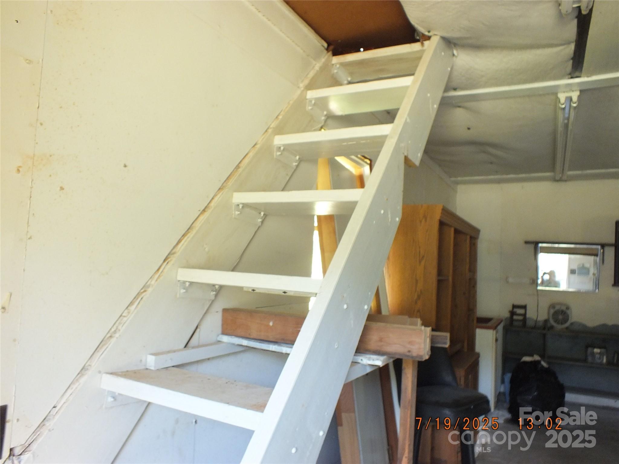 1453 Old Landsford Road Lancaster, SC 29720 - Photo 30 of 39 a view of staircase with railing and white walls
