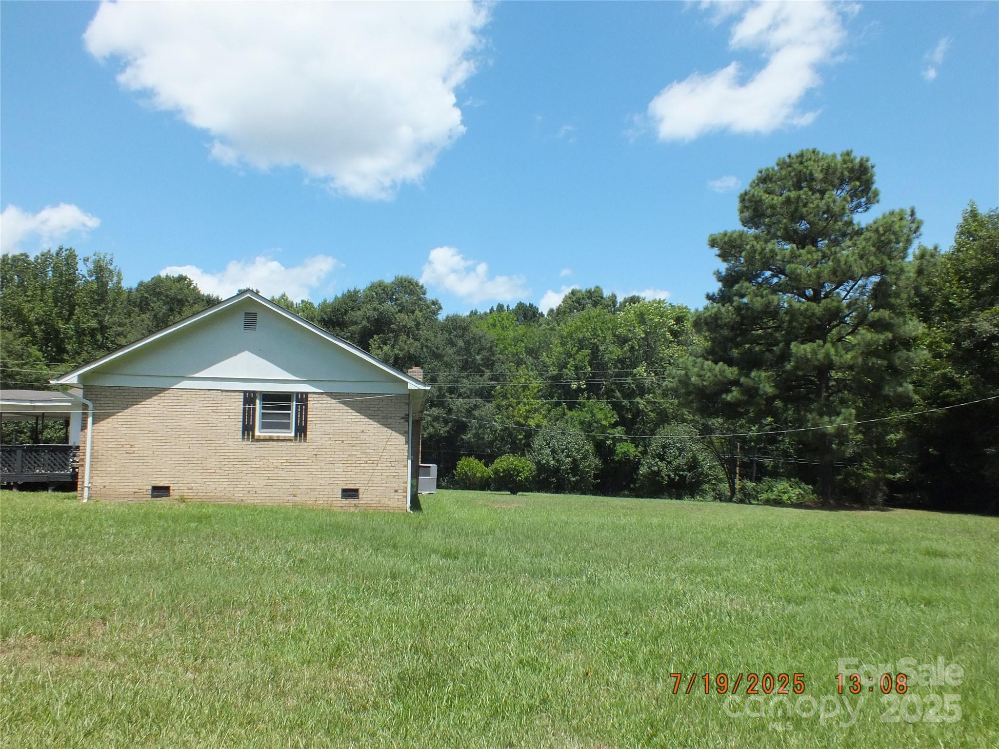 1453 Old Landsford Road Lancaster, SC 29720 - Photo 35 of 39 a view of an house with backyard space and garden