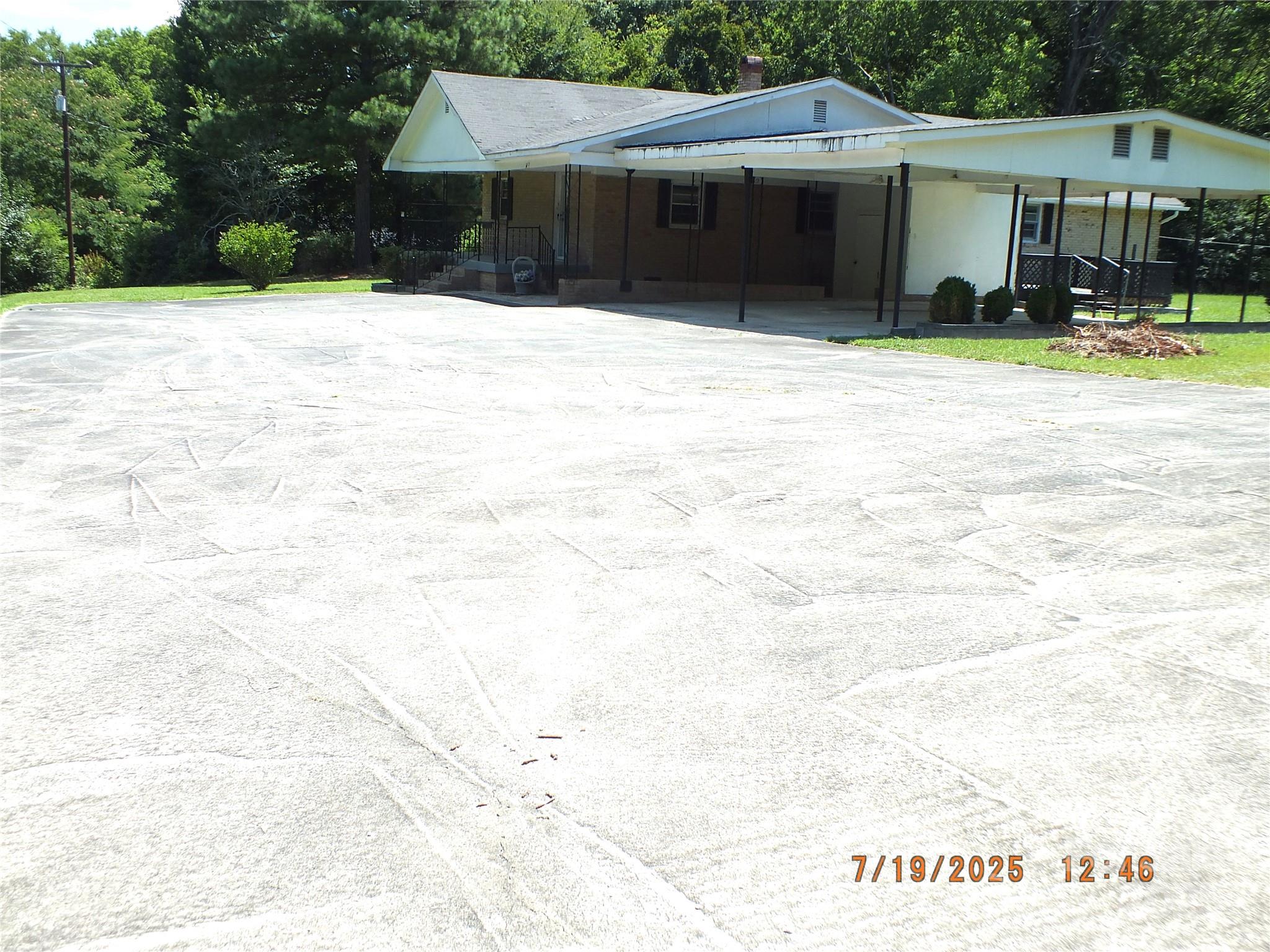 1453 Old Landsford Road Lancaster, SC 29720 - Photo 37 of 39 a front view of a house with a yard