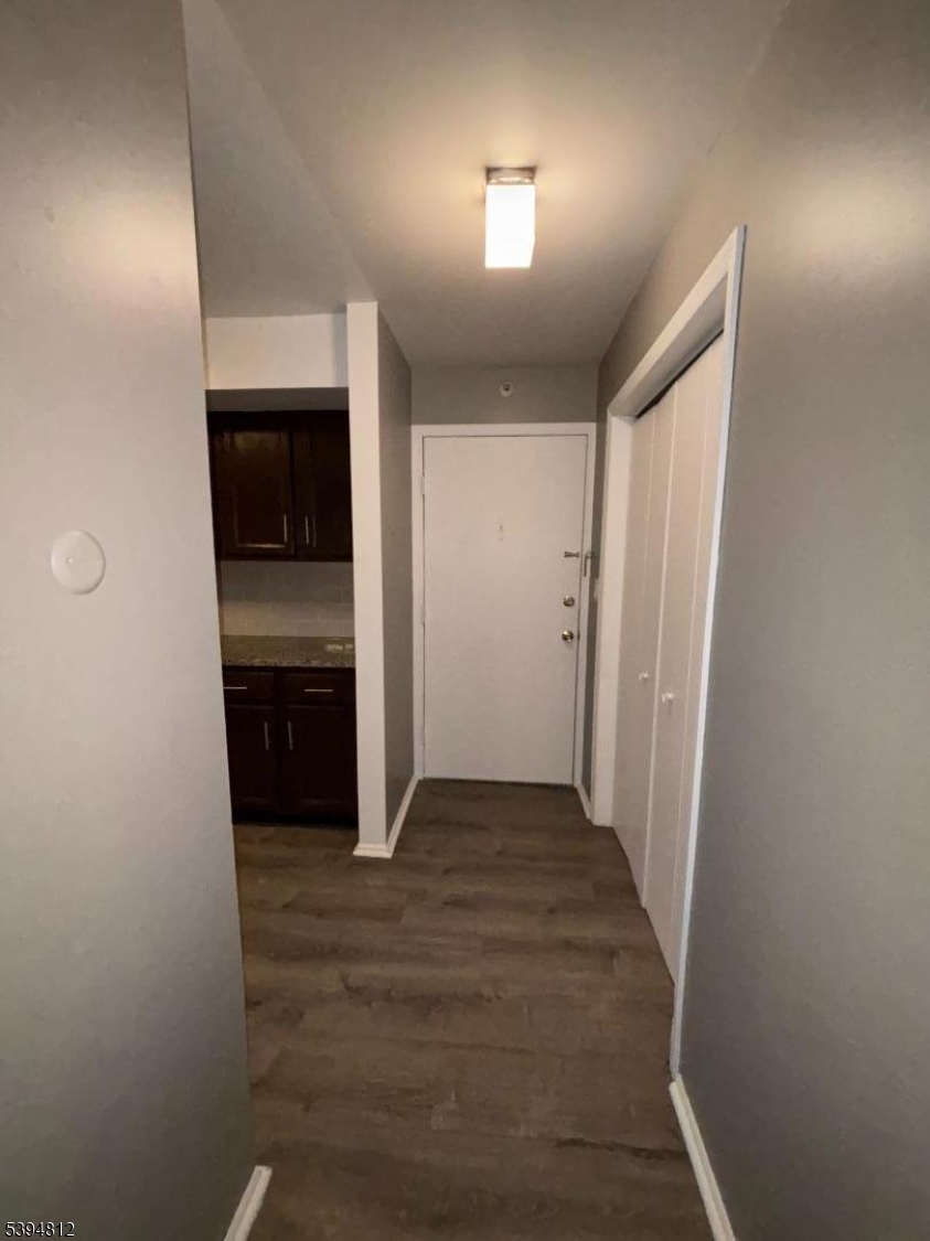 42 Powderhorn Court Woodbridge, NJ 07095 - Photo 12 of 14 a view of a hallway