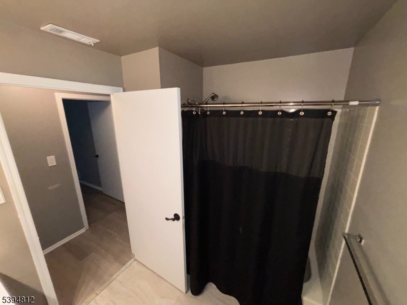 42 Powderhorn Court Woodbridge, NJ 07095 - Photo 10 of 14 a view of walk in closet