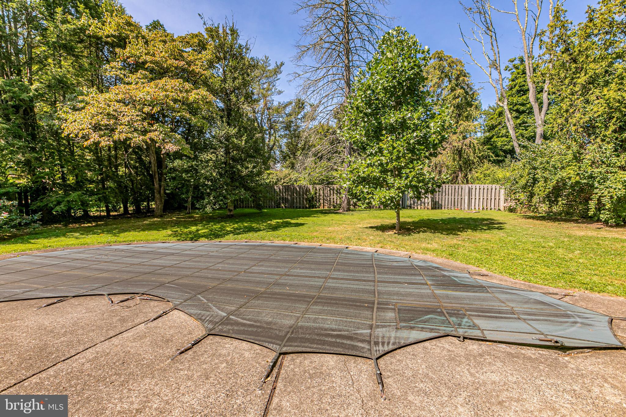 50 Broadripple Drive Princeton, NJ 08540 - Photo 12 of 17 a view of a swimming pool with an outdoor space and seating area