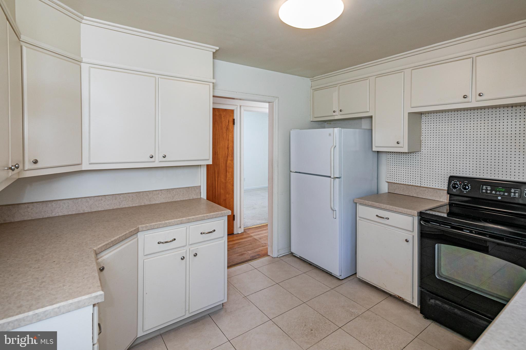 50 Broadripple Drive Princeton, NJ 08540 - Photo 7 of 17 a kitchen with cabinets and appliances