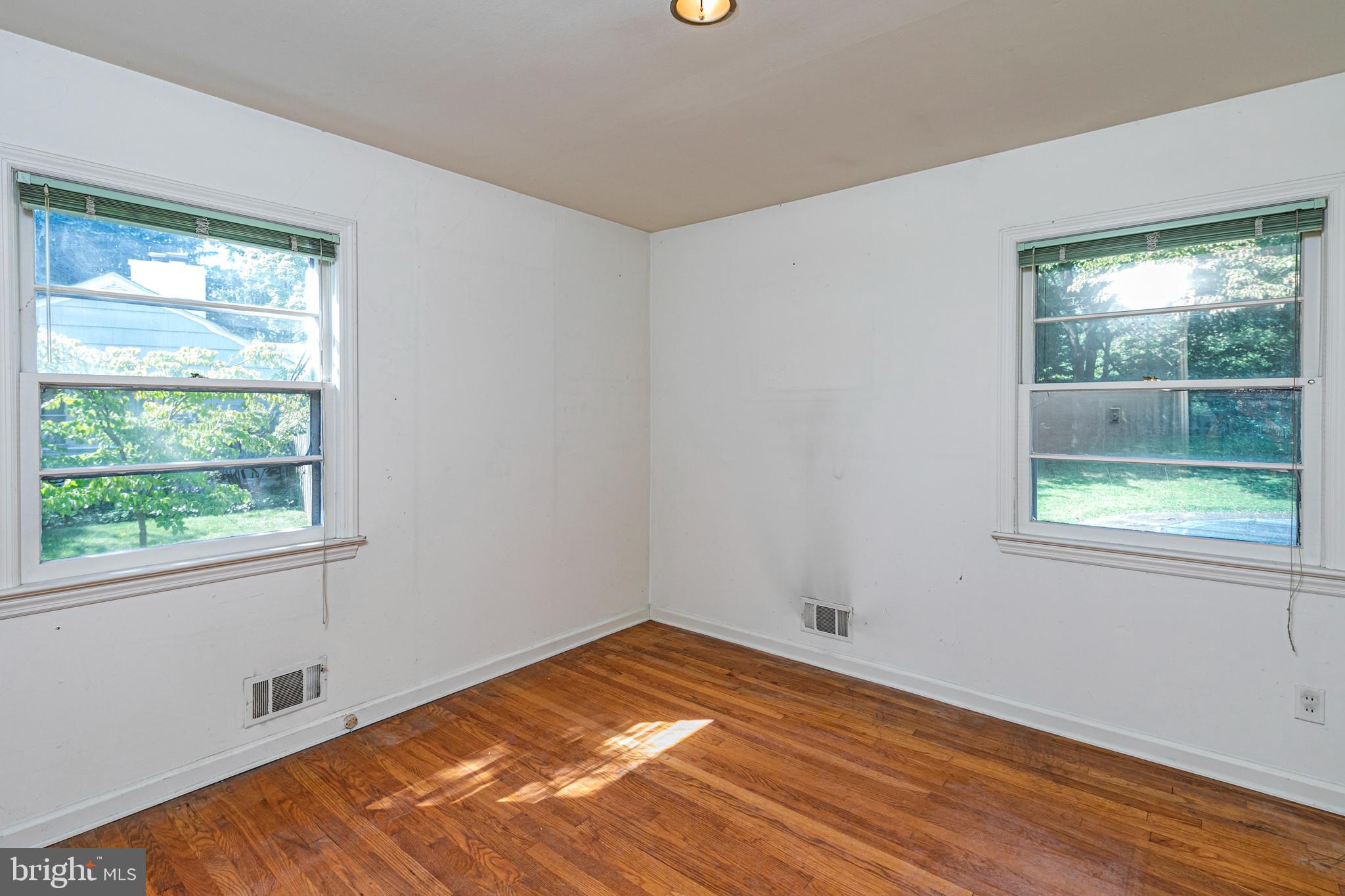 50 Broadripple Drive Princeton, NJ 08540 - Photo 10 of 17 a view of empty room with wooden floor and fan