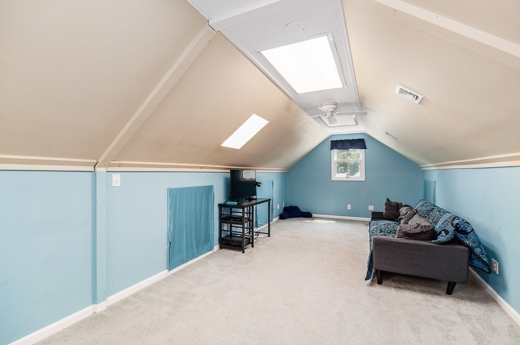 28 Gregg Street Beverly, MA 01915 - Photo 17 of 31 a bedroom with furniture and a window