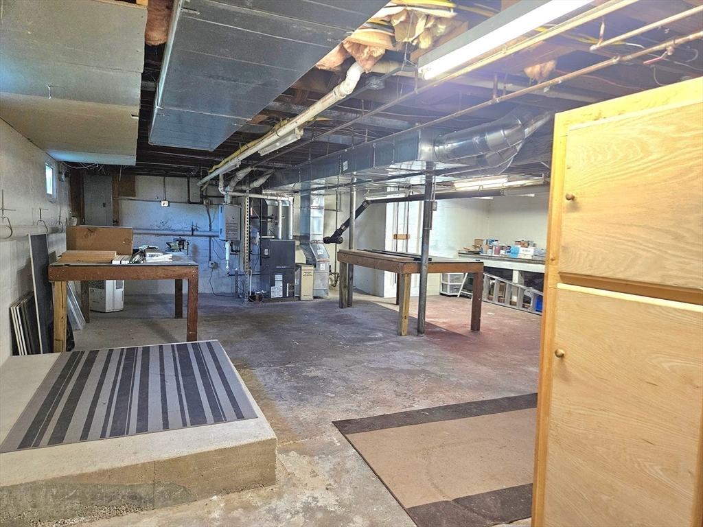 28 Gregg Street Beverly, MA 01915 - Photo 22 of 31 a view of a swimming pool with a patio