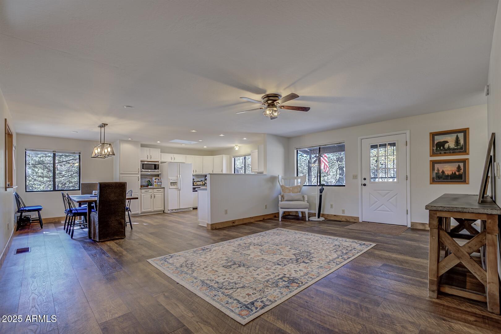 4823 Rim View Loop Pine, AZ 85544 - Photo 12 of 70 a living room with furniture and wooden floor