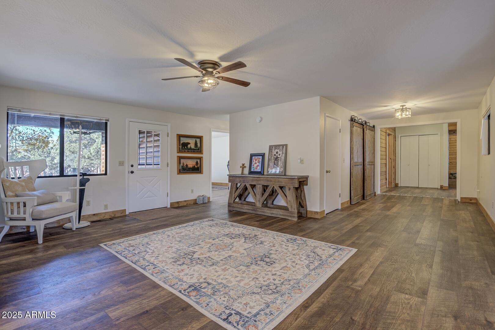 4823 Rim View Loop Pine, AZ 85544 - Photo 14 of 70 a living room with furniture and a wooden floor