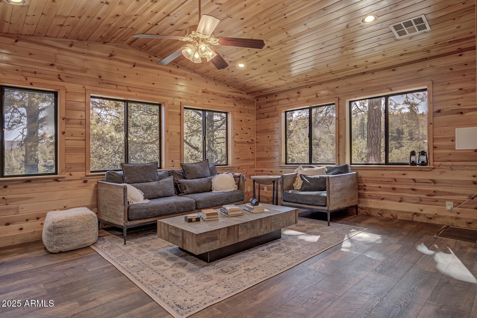 4823 Rim View Loop Pine, AZ 85544 - Photo 23 of 70 a living room with furniture and a large window
