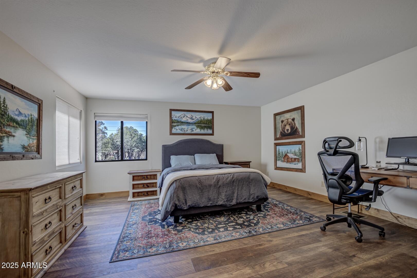 4823 Rim View Loop Pine, AZ 85544 - Photo 24 of 70 a living room with a bed furniture and a window