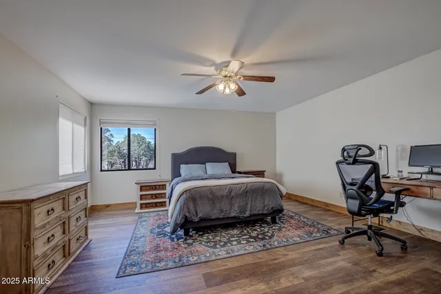 a bathroom with double vanity sinks a vanity and a mirror
