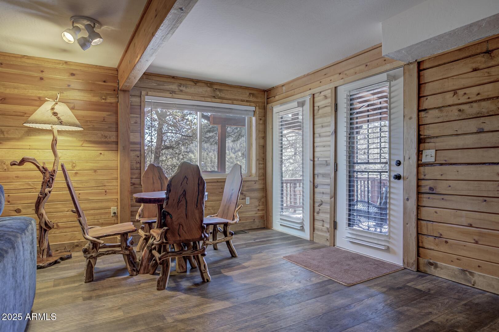 4823 Rim View Loop Pine, AZ 85544 - Photo 41 of 70 a view of a dining room with furniture and chandelier
