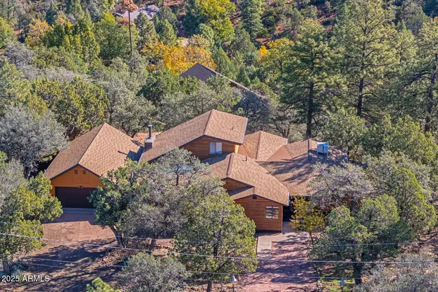 a view of a livingroom with furniture and window