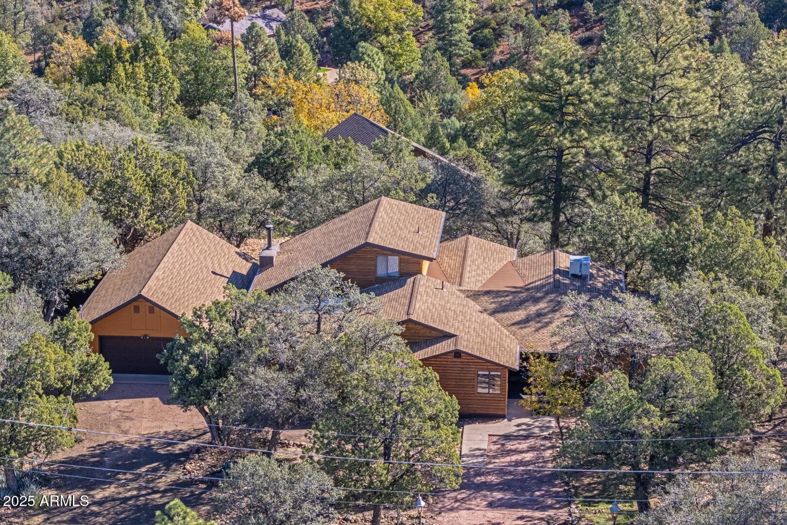 4823 Rim View Loop Pine, AZ 85544 - Photo 6 of 70 an aerial view of house with yard and mountain view in back