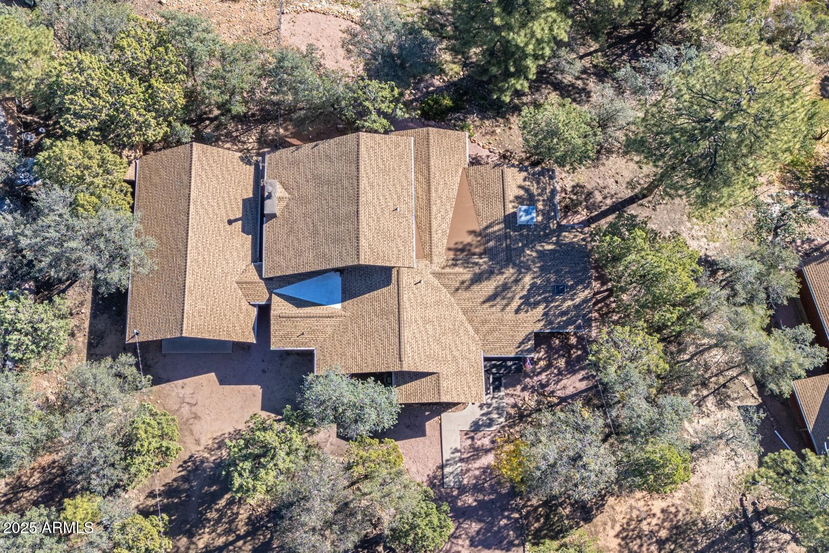4823 Rim View Loop Pine, AZ 85544 - Photo 68 of 70 an aerial view of a house with a yard and large tree