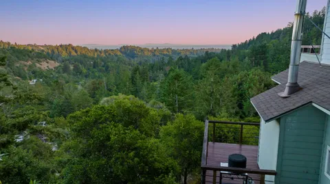 a view of a chairs and table in the terrace