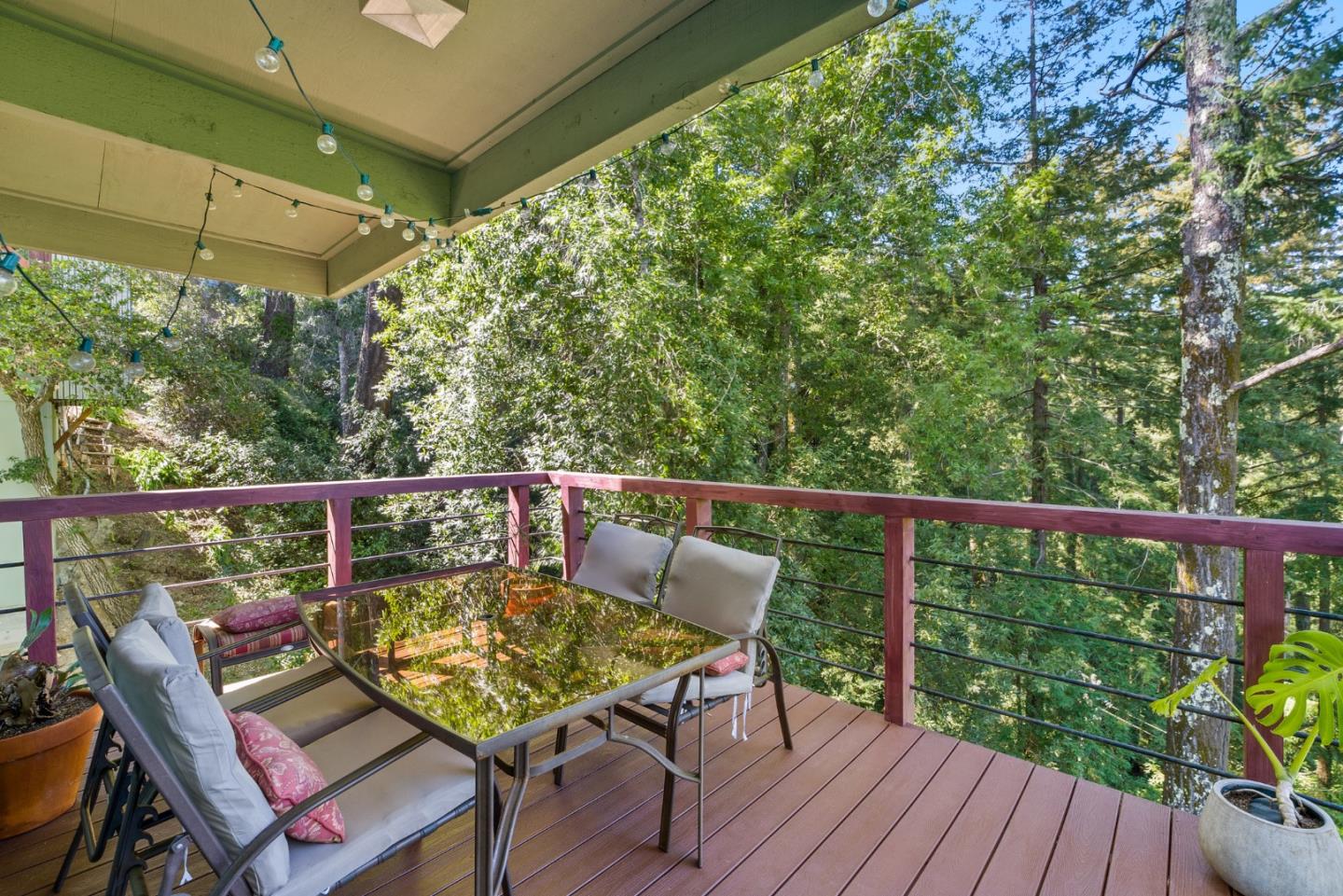 540 Olaughlin Road Santa Cruz, CA 95065 - Photo 23 of 42 a view of a balcony with wooden floor and outdoor seating