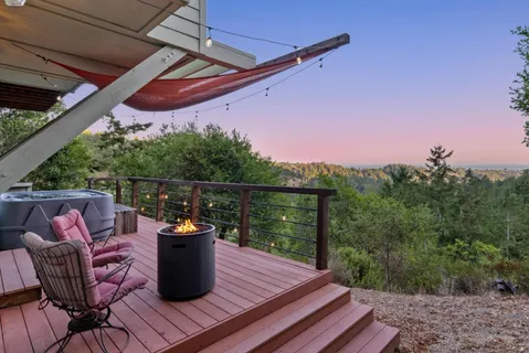 a view of a deck with wooden floor and outer view