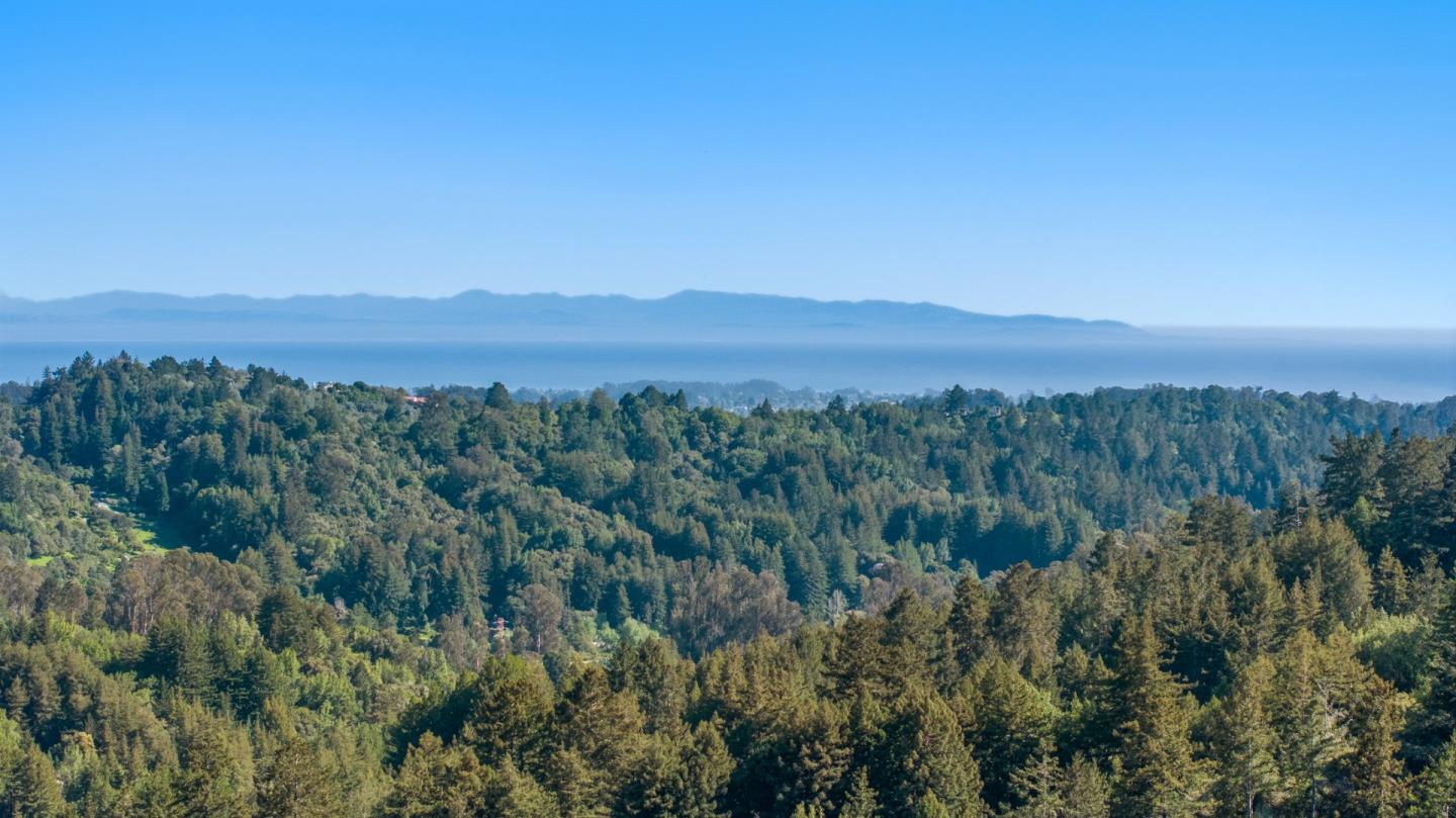540 Olaughlin Road Santa Cruz, CA 95065 - Photo 31 of 42 a view of a city with lush green forest