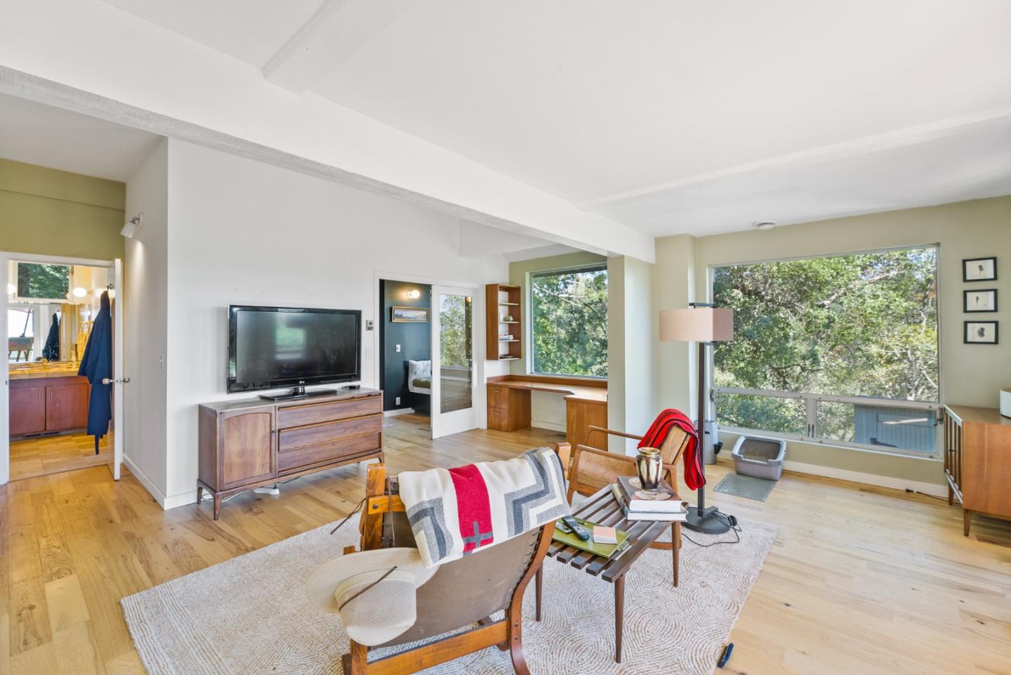 540 Olaughlin Road Santa Cruz, CA 95065 - Photo 34 of 42 a living room with furniture and a flat screen tv