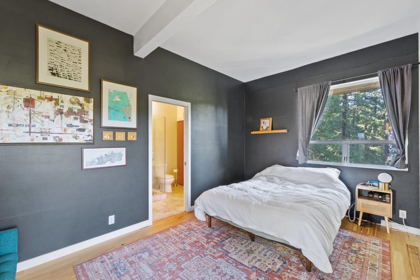 540 Olaughlin Road Santa Cruz, CA 95065 - Photo 35 of 42 a bedroom with a bed and a window