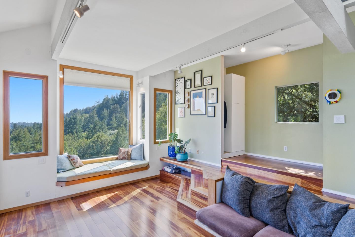 540 Olaughlin Road Santa Cruz, CA 95065 - Photo 5 of 42 a living room with a couch and a table