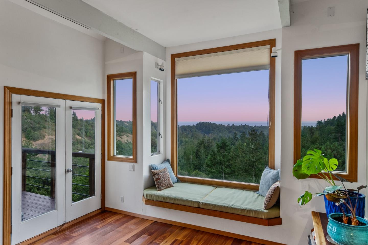 540 Olaughlin Road Santa Cruz, CA 95065 - Photo 6 of 42 a view of a room with a large window and wooden floor