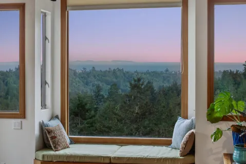 a view of balcony with furniture