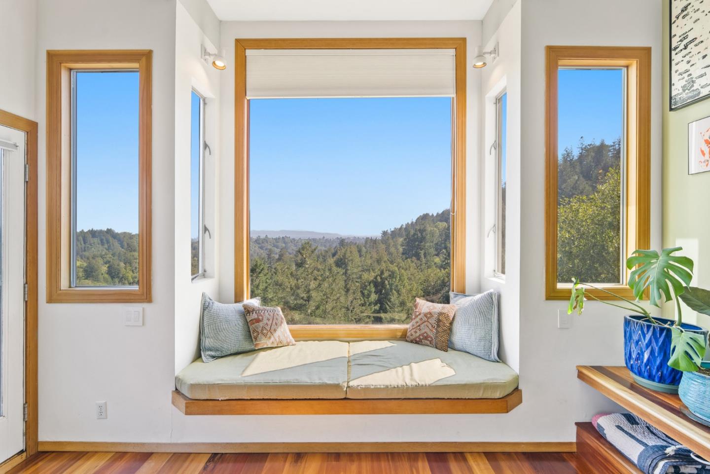 540 Olaughlin Road Santa Cruz, CA 95065 - Photo 9 of 42 a living room with a large window and table