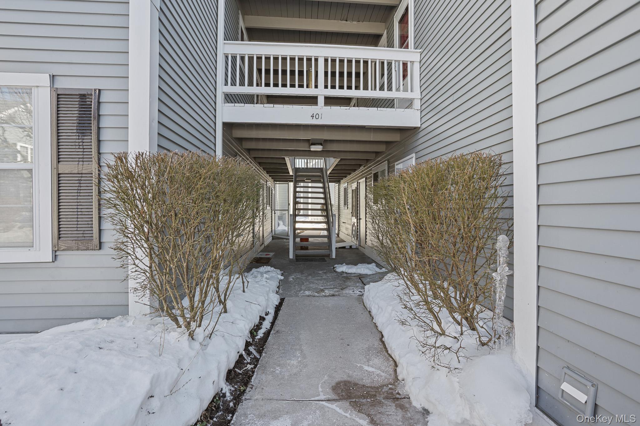 401 Commons Way, Unit H Fishkill, NY 12524 - Photo 1 of 1 a view of a porch with a bench