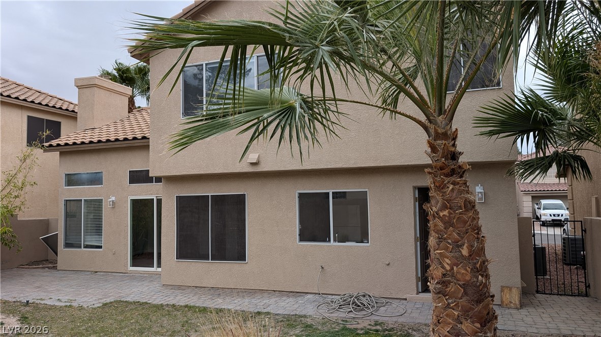 2670 Ridgewater Circle Henderson, NV 89074 - Photo 22 of 22 This spacious two-story home features a tiled roof and ample outdoor living space.